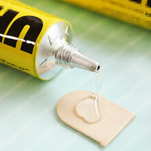 Adhesive