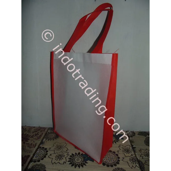 Tas Spunbond Putih Kombinasi Merah Ukuran 35X26x10 Cm