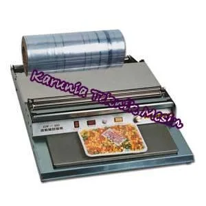 MESIN WRAPPING ( PEMBUNGKUS MAKANAN )