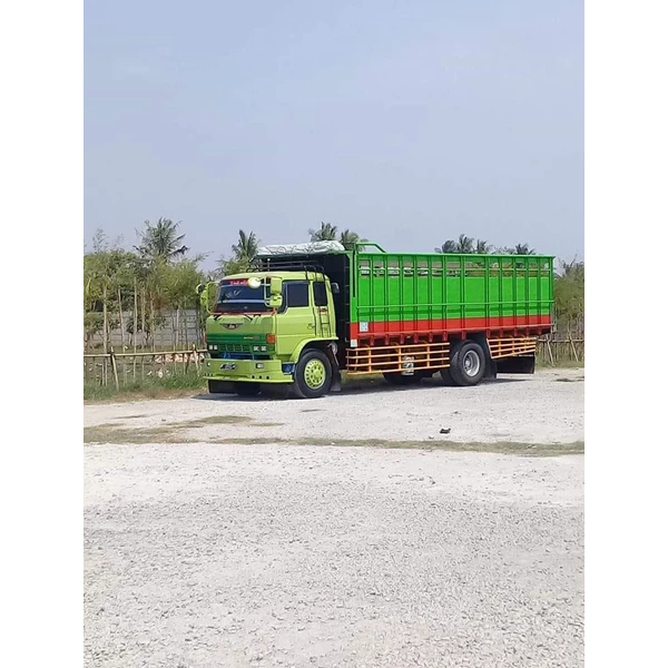 KHAMANLOG Sewa Fuso Surabaya - Denpasar By PT. Khatulistiwa Mandiri Logistik