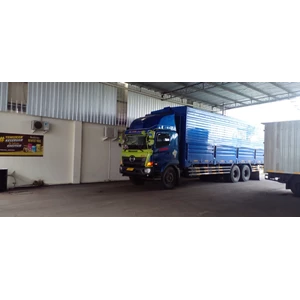 Logistik Pengiriman Barang Via Truk Wingbox Surabaya – Jakarta