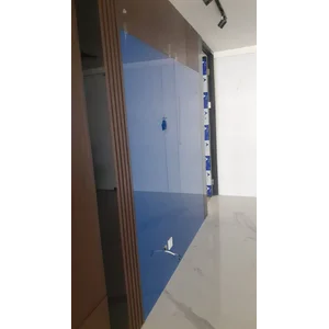 Glasstone Blue custom background receptionist glass per M2