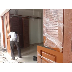 PINTU GARASI GESER MENIKUNG